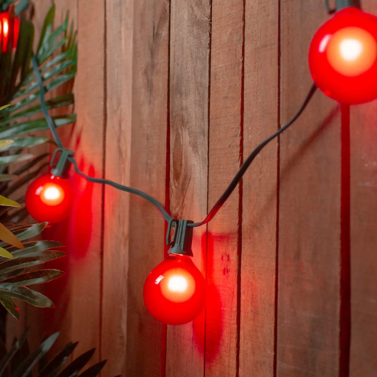 Set of 15 Red Satin G50 Globe Christmas Lights - Green Wire Globes