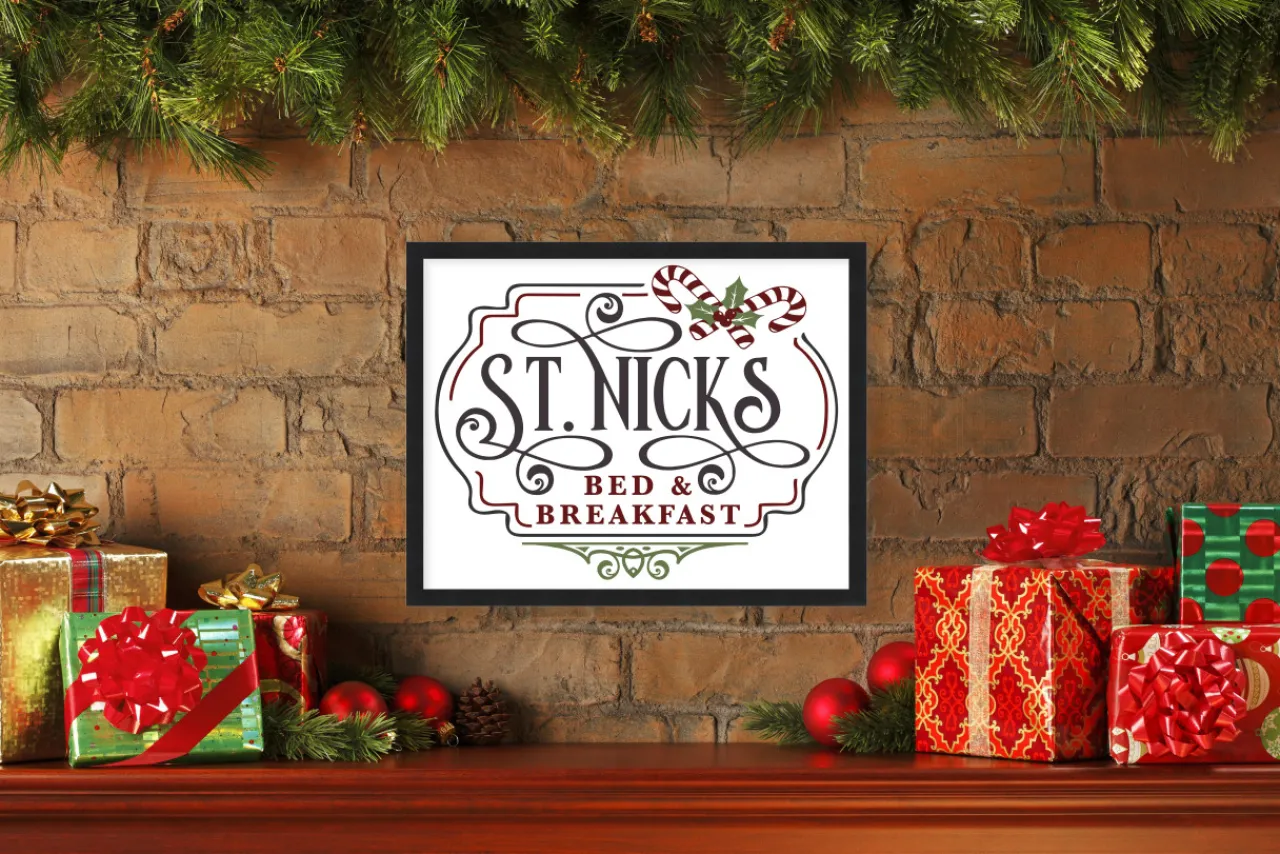 Hot St Nick's Bed and Breakfast 15.5" x 19.5" Framed Christmas Wall Decor Art Print Sign Poster in a Black Wooden Frame with UV Acrylic and Hangers Wall